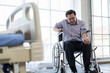 © eakgrungenerd - Senior man sitting in wheelchair near hospital bed at home, feeling tired and stressed. Concept of elderly healthcare, disability support, rehabilitation, recovery, medical care and aging lifestyle.