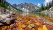 © tashechka - Mountains and clear lake with colorful rocks in bright daylight