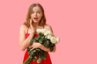 © Pixel-Shot - Beautiful surprised woman with bouquet of white roses on pink background