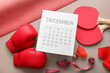 © Pixel-Shot - Set of sports equipment and paper calendar on color background