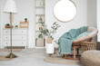 © Pixel-Shot - Interior of light living room with armchair and trash bin