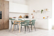 © Pixel-Shot - Blurred view of light kitchen with counters, shelf and dining table