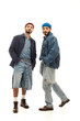 © LIGHTFIELD STUDIOS - Stylish twin brothers showcase their trendy fashion in casual denim outfits