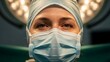 © improvee design - Close-up Portrait of a Surgeon in Surgical Mask and Cap Under Operating Room Lights.