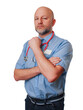 © mark_gusev - A man in a blue shirt and jeans is wearing a red stethoscope and has a black name or id badge. Male doctor in his 40s or 50s with bald head and short beard. White background. Calm and confident look.