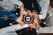 © InfiniteFlow - Aerial view of hands joined together, symbolizing collaboration and teamwork in business management. Technology elements highlight modern connections and growth strategies. Amity