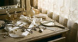 © SNG_J - Nostalgic and romantic still life on a vintage vanity with antique perfume bottles, pearls, and a hand mirror.