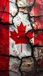© Ambar - Cracked surface displaying Canada's flag, with vivid red and white colors on a textured, damaged background