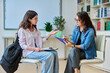 © Valerii Honcharuk - Female teacher, counselor working with school student teenage girl