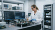 © Алексей Колесников - Female scientist in a modern laboratory inspecting and testing electronic circuitry on a precision workstation with multiple monitors, racks of equipment, and lab apparatus