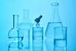 © Marevgenna - Scientific laboratory glassware filled with blue liquid