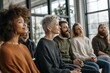 © asAI12 - Diverse group smiles during a bright, indoor event or meeting