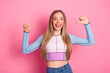 © deagreez - Charming girl posing with confidence and a happy expression, wearing trendy casual fashion on a pink background