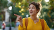 © Kateryna - Faceless young female student outdoors surprised with expressive gesture pointing finger to side casual education scene campus life student lifestyle outdoor learning academic