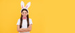 © Olena - happy easter teen girl in bunny ears and bow tie. Easter child horizontal poster. Web banner header of bunny kid, copy space.