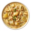 © Carakde - Creamy chicken and potato stew, garnished with herbs and spices