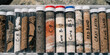 © designermetin - Close up view of extracted geological soil core samples stored inside clear plastic tubes with written labels