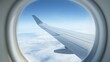 © Akanei - porthole. Airplane wing view through a porthole window revealing dreamy clouds beneath a gradient blue sky. mobility guides, transit brochures, designed for mobility and urban transit guides.