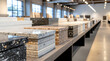 © Yudi - Stacked samples of various natural and engineered stone countertops for kitchen and bath renovations in a brightly lit showroom
