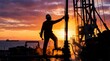 © Anusa - Sunset oil rig worker offshore photography industrial silhouette viewpoint energy extraction concept