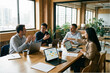 © Gstock - Productive Team Meeting in a Contemporary Workspace