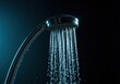 © dadtophoto - Thoughtful reduction of water flowing from a modern shower head, demonstrating smart conservation practices for global resource preservation, drought, future, consumption
