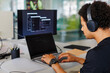 © BONNINSTUDIO/Stocksy - Software developer writing code on laptop working on computer