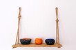 © Tania Cervian/Stocksy - Composition of decorative bowls on shelf