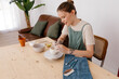 © Tania Cervian/Stocksy - Content artist crafting clay on pottery wheel