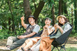 © buritora - Parents and children/families chairing in parks and campsites