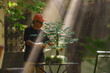 © Leonardo Borges/Stocksy - Bonsai care in natural light