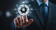 © Ohida - Businessman interacting with digital interface touching virtual button with copyright symbol