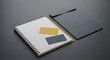 © Retno - Modern minimalist desk setup with notebook and stationery on a dark gray surface.