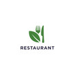 © Logo - Restaurant Logo Featuring Green Utensils and Leaf