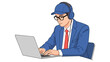 © hendrik00 - Focused Young Professional Working on Laptop with Headphones and Cap