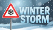 © Hina - A winter storm warning sign in a snowy landscape with falling snowflakes and a red triangle