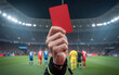 © Shreyas - Soccer Referee Raising Red Card in Dramatic Close Up with Blurred Stadium Crowd, Authority Gesture, and Cinematic Lighting Capturing Ejection, Discipline, and Intense Football Match Moment