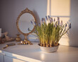 © Buyanskyy Production - Elegant Vintage Vanity with Blooming Flowers in Morning Light