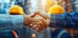 © zhuan - Close-up handshake between architect with blueprint sleeve and construction worker with hard hats in background, conveying trust and collaboration
