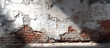© oswasa - Weathered wall showing crumbling white plaster from red brick