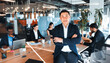 © Valerii Apetroaiei - Confident Business Executive Leading Diverse Team in Office