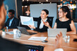 © Valerii Apetroaiei - Businesswomen Presenting Growth Chart During Corporate Meeting