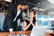© Valerii Apetroaiei - Manager Supporting Employee During Office Work