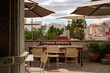 © tessy morelli/Stocksy - Cute modern and chic rooftop cafe