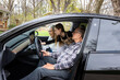 © Bethany Birnie/Stocksy - Family time in electric car