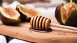 © homydesign - Wooden Honey Dipper with Fresh Halved Figs and Honey on a Rustic Cutting Board
