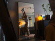 © Ivan Andrianov/Stocksy - Man Doing Handstand Lifestyle in Mirror At Home