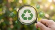 © Prime path 515 - Environmental sustainability concept with recycling symbol under magnifying glass in forest background for eco research and green technology development