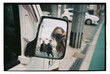 © Asya Molochkova/Stocksy - Street Reflection Through a Van Mirror