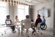 © Hernandez & Sorokina/Stocksy - Office Business Meeting With Graph Presentation
